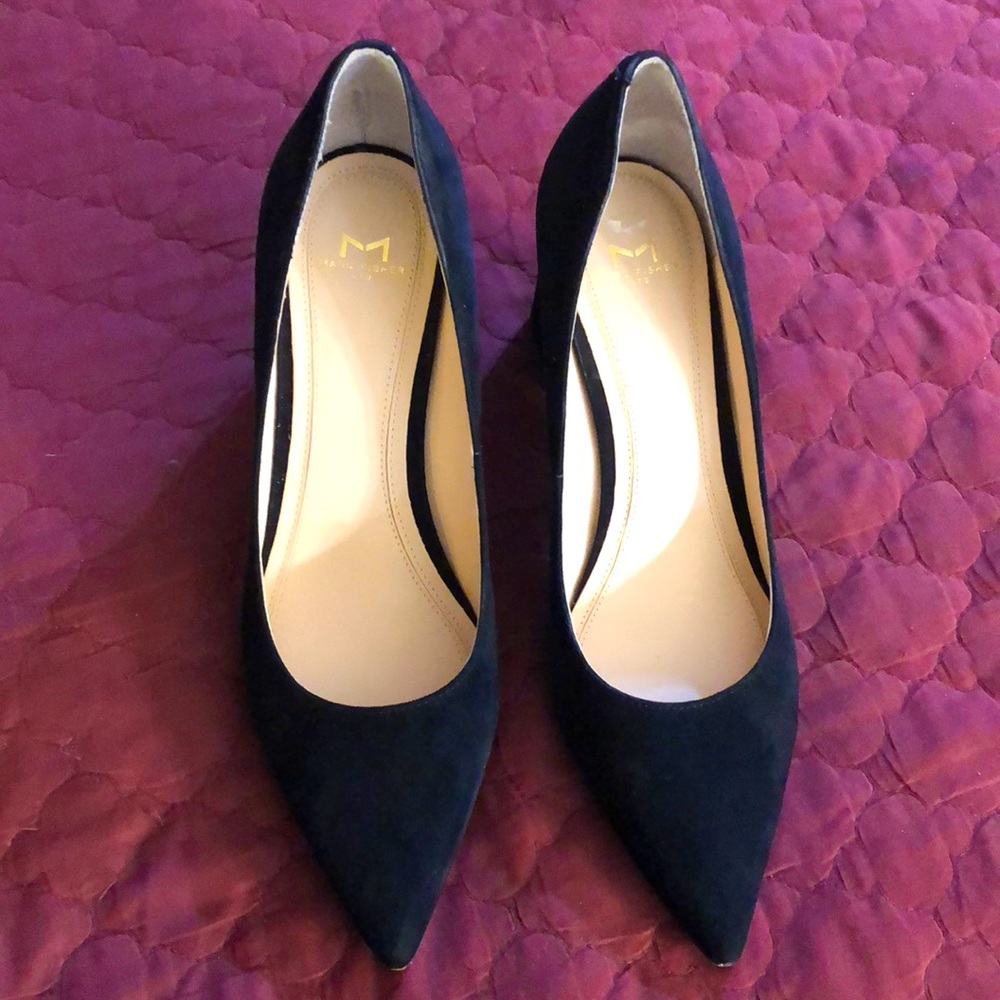 Slightly used Marc Fisher suede heels. Light scuffing on back of heels.